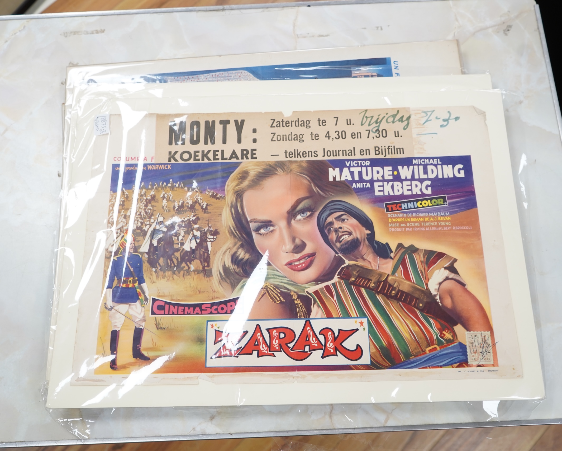 Seven original Belgian 1950’s film posters to include ‘Les Bas-Fonds de Chicago’, 38cm x 54cm